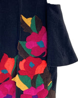 Abrigo en paño cut out