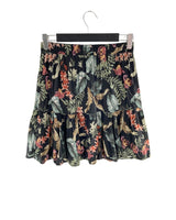 Falda mni amplia encauchada