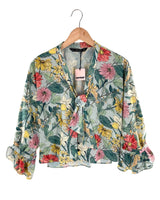 Blusa manga larga con vuelo