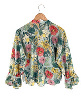 Blusa manga larga con vuelo