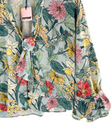 Blusa manga larga con vuelo