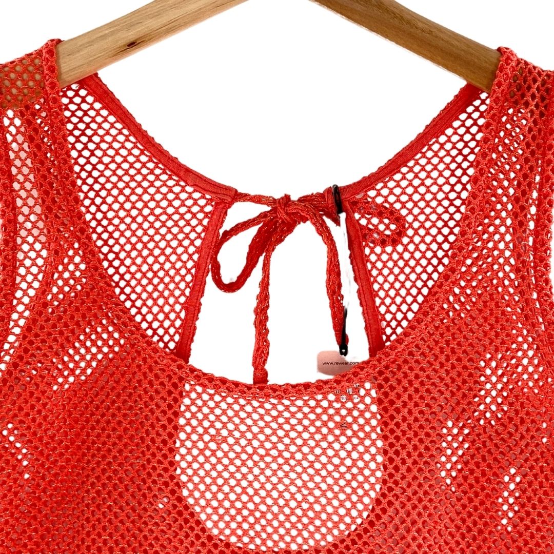 Blusa sleeveless translúcida