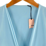 Blusa crop satinada anudada
