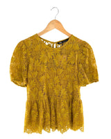 Blusa en blonda peplum