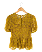 Blusa en blonda peplum