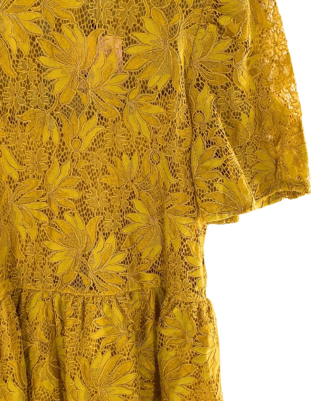 Blusa en blonda peplum