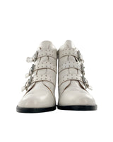 Botines en cuero con correas