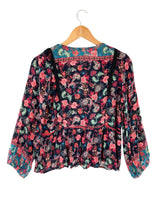 Blusa manga larga con flecos