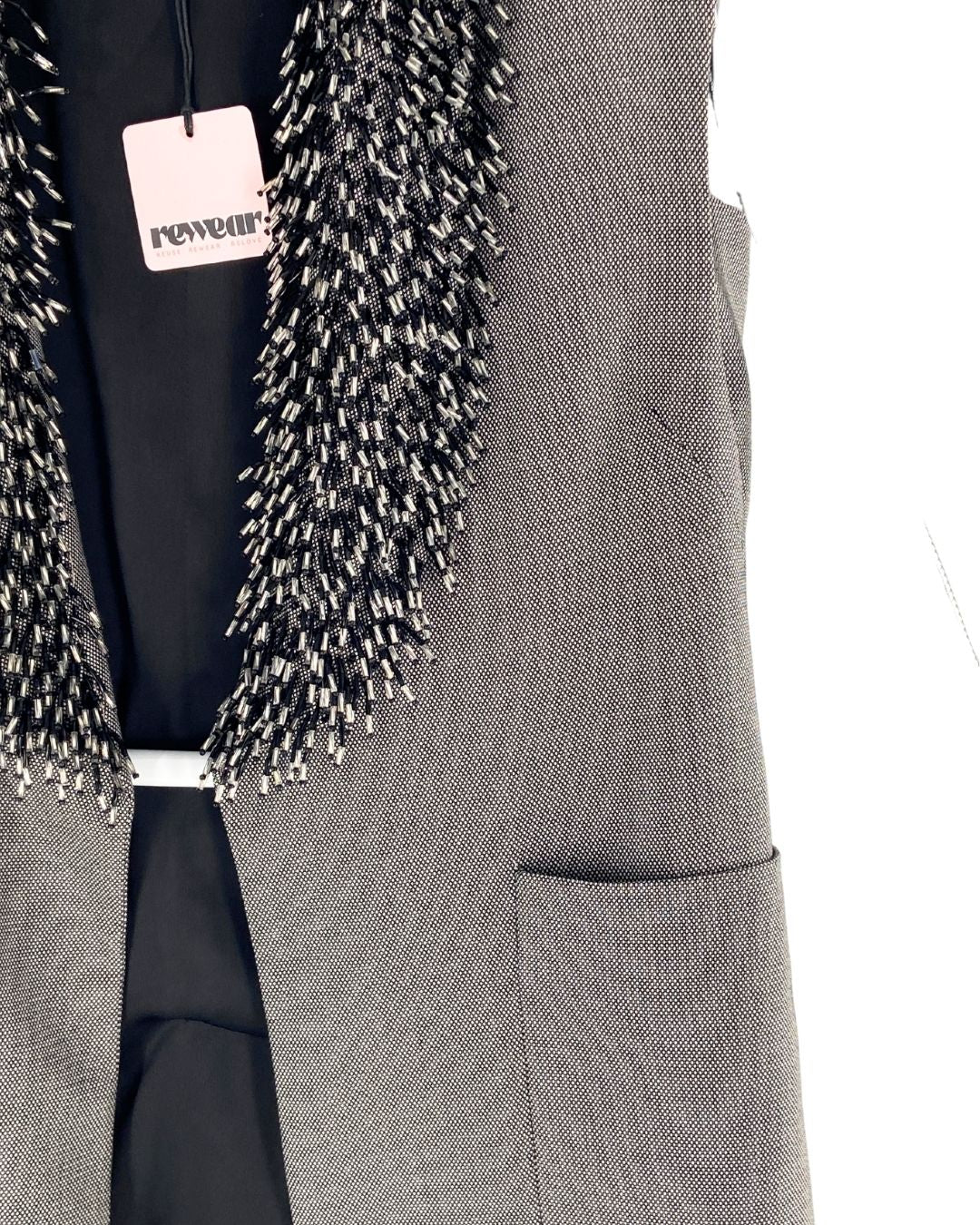 Chaleco midi con recamado