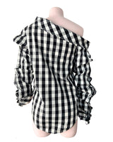 Blusa mangas extra largas