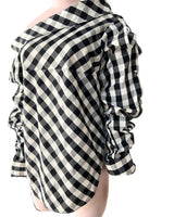 Blusa mangas extra largas