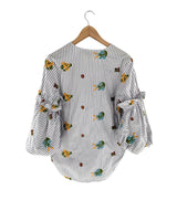 Blusa a rayas con bordados