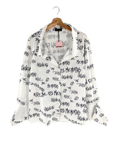 Camisa print y detalle en puño