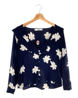 Blusa manga larga con vuelo