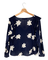 Blusa manga larga con vuelo