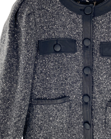 Chaqueta tweed con detalles