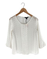 Blusa traslúcida