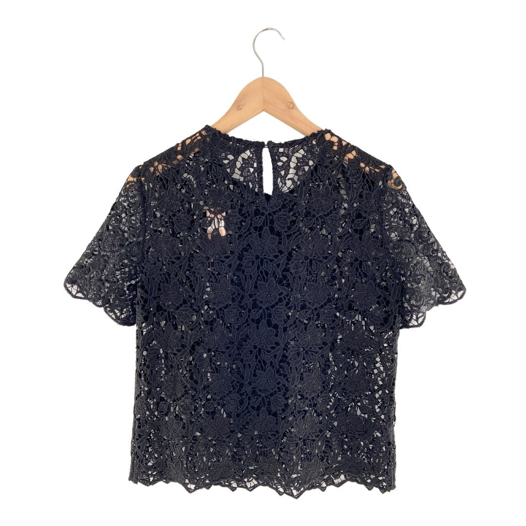 Blusa manga corta translúcida