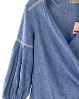 Blusa anudada con textura