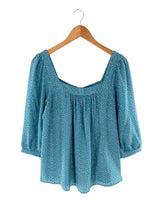 Blusa con textura print mini