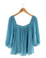 Blusa con textura print mini