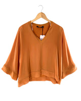 Blusa traslúcida