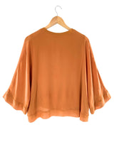 Blusa traslúcida