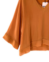 Blusa traslúcida