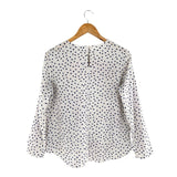Blusa manga larga con textura