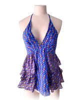 Blusa cuello halter con vuelos