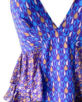 Blusa cuello halter con vuelos