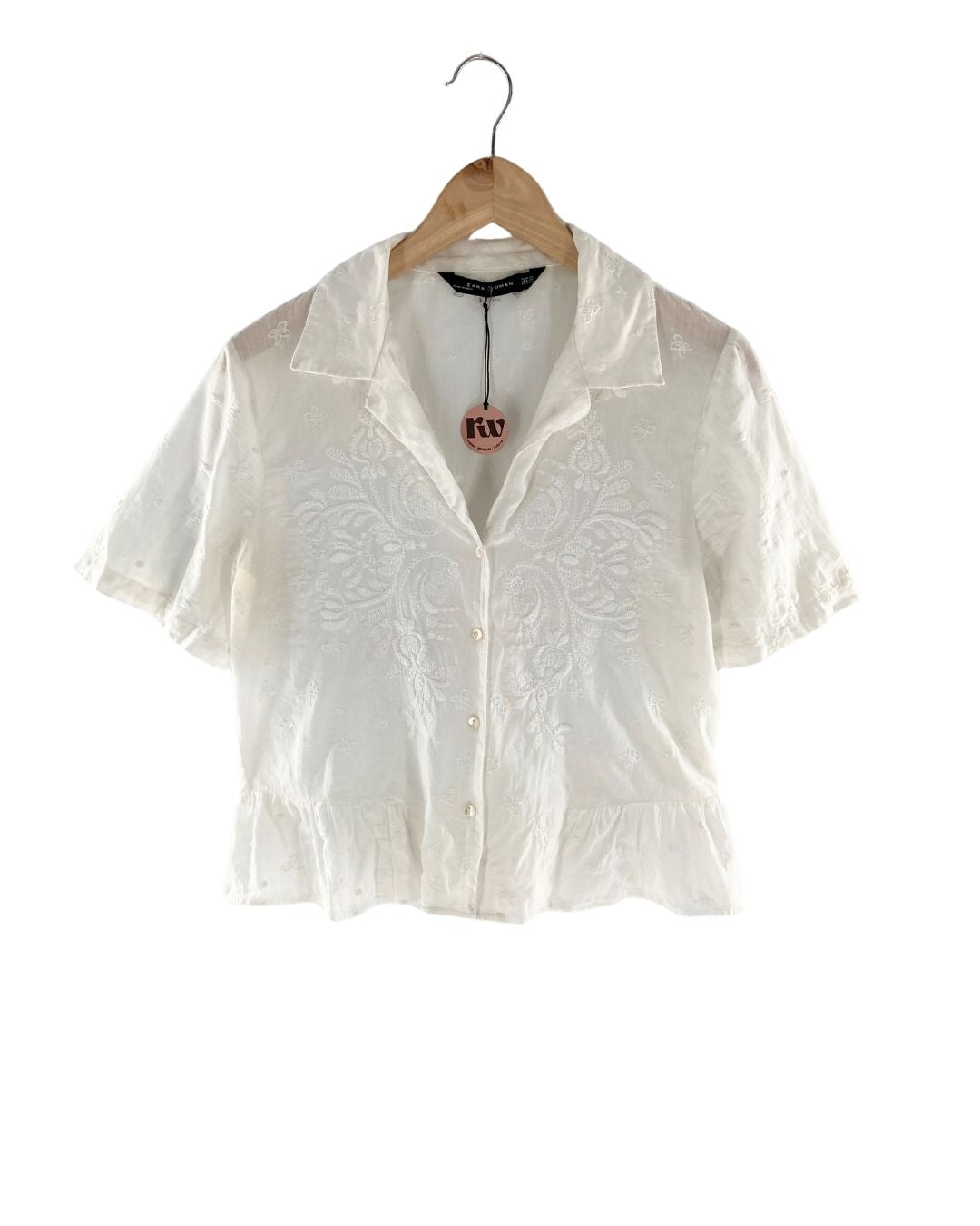 Camisa crop manga corta