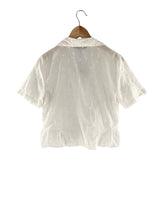 Camisa crop manga corta