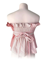 Blusa strapless con anudados