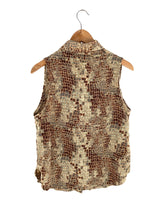 Blusa sleeveless abotonada