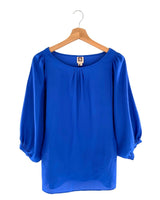 Blusa satinada mangas globo