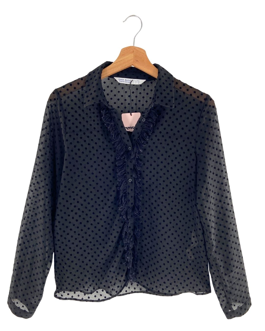 Blusa traslúcida manga larga