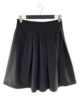 Falda midi con prenses