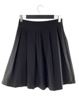 Falda midi con prenses