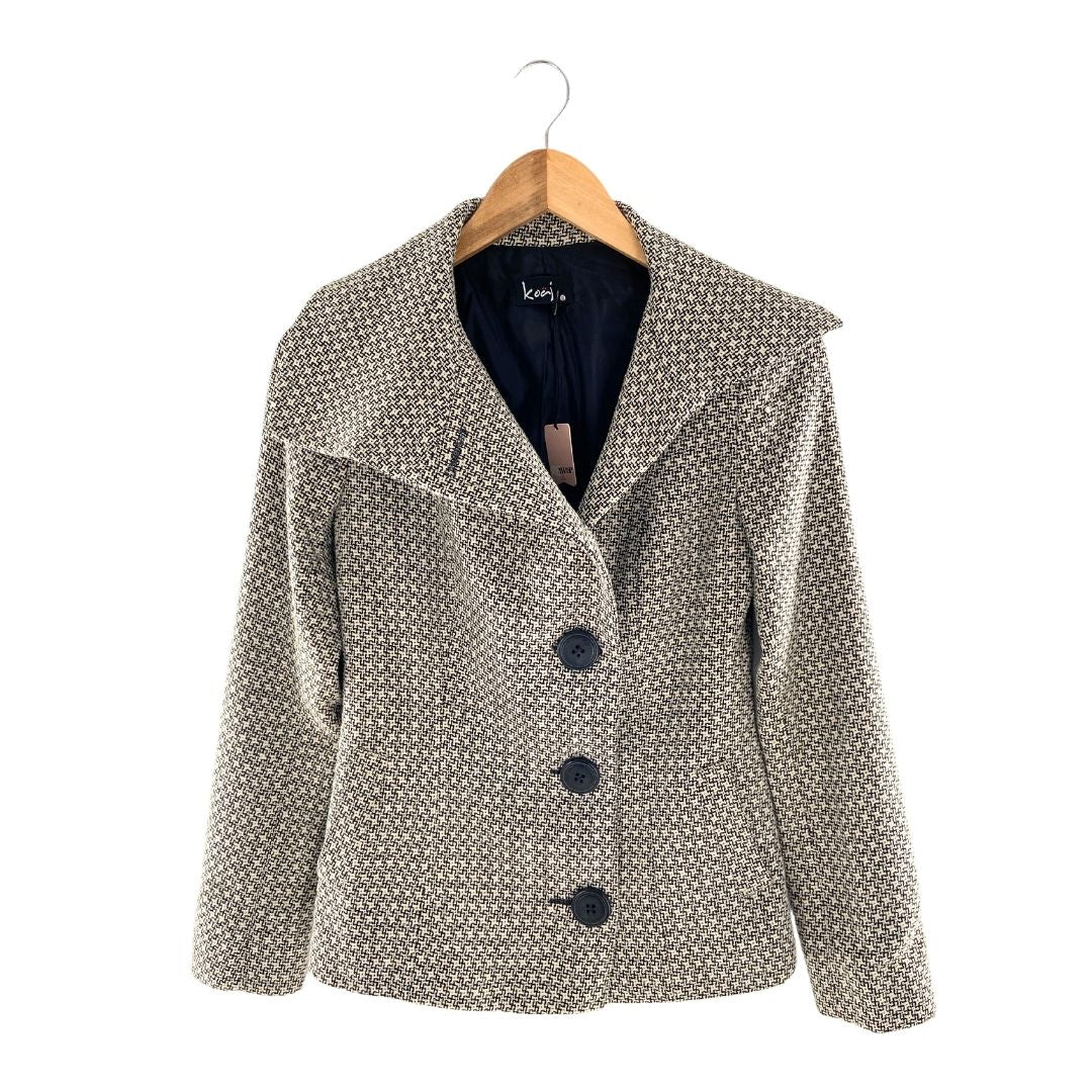 Chaqueta cuello asimétrico