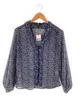 Blusa traslúcida print flores