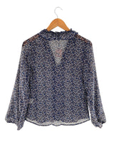 Blusa traslúcida print flores
