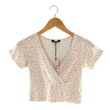 Blusa crop cruzada manga corta