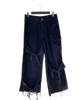 Jean rigído botas deshiladas