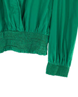 Blusa crop manga larga