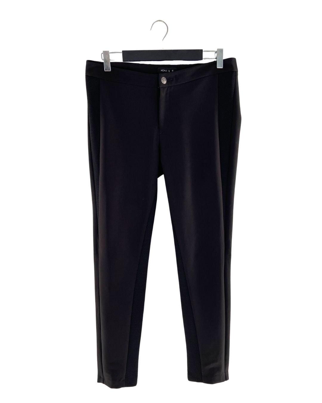 Pantalón sastre con detalles