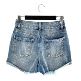 Short mini en denim rígido