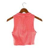 Crop top canalé con cremallera