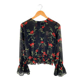 Blusa translúcida encauchada