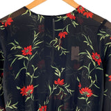 Blusa translúcida encauchada